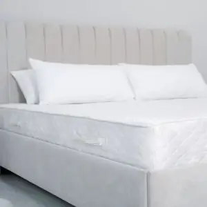 White fitted bed sheet on hotel mattress – INEQUIP