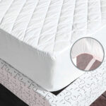 Blue quilted mattress protector with soft padding – INEQUIP