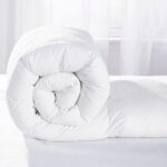 White filled duvet comforter rolled for hotel bed – INEQUIP